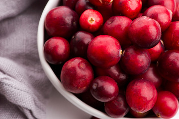 Ceramic bowl of Cranberry on white background