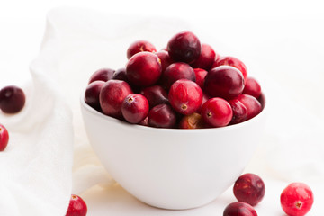 Ceramic bowl of Cranberry on white background
