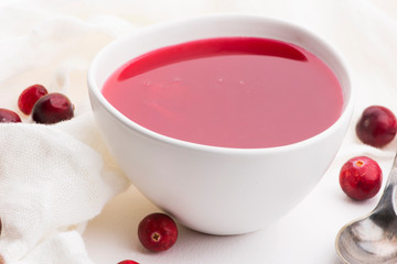 Bowl of Jelly with Cranberry on a white background