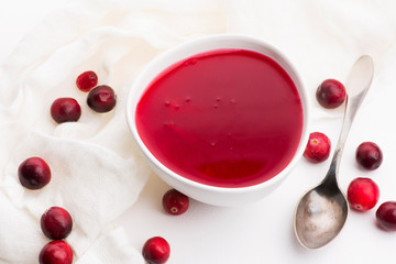 Bowl of Jelly with Cranberry on a white background