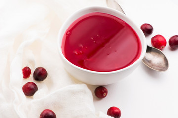 Bowl of Jelly with Cranberry on a white background