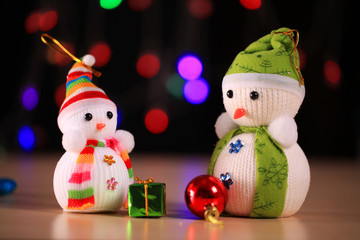 Festive snowman with Christmas light background