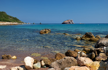 Obraz premium The view of the blue Takkas bay with Aphrodite's Rock. Akamas Peninsula. Cyprus