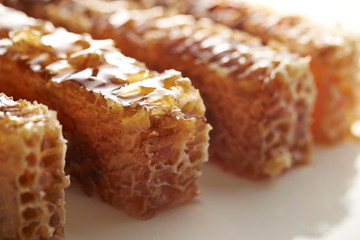 Honey comb on white background 