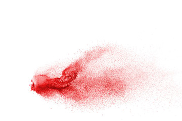 Explosion of red powder on black background