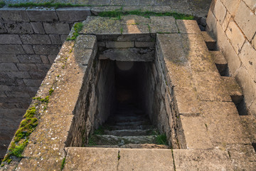 Exit from the dark stone basement