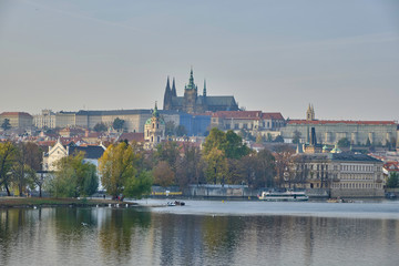 Scenic panorama with Prague Castle (Prazsky hrad) and Vlatva river in capital of Czech Republic Prague. Beautiful summer sunny cityscape of the biggest city of Czechia