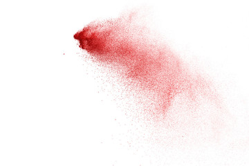 Fototapeta premium Explosion of red powder on black background