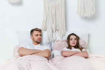 Young adult family spending morning in bedroom