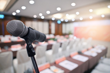 Microphone over the blurred business people forum Meeting Conference Training Learning Coaching...