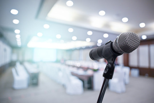 Microphone over the blurred business people forum Meeting Conference Training Learning Coaching Concept, Blurred background