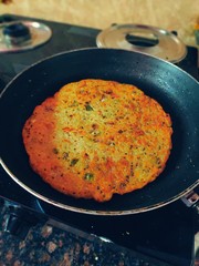 Handvo is a vegetable cake originating from the Gujarat or Gujarati snack cake. selective focus