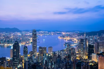 Foto op Plexiglas Hong Kong modern cityscape sightseeing view from Victoria peak before sunrise.  © May_Chanikran
