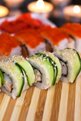 Sushi fragment on blackboard close-up 