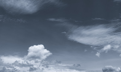 Dark dramatic sky and clouds. Background for death and sad concept. Gray sky and fluffy white...