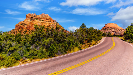 The Kolob Terrace Road as it winds its way through the Red Sandstone Mountains to the 8,000 ft altitude of the Kolob Plateau in Zion National Park, Utah, United States