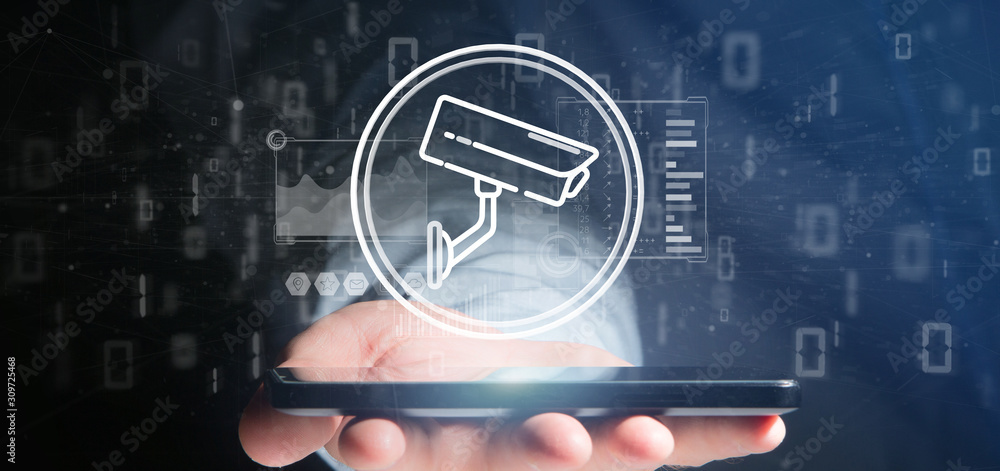 Poster businessman holding security camera system icon and statistics data - 3d rendering
