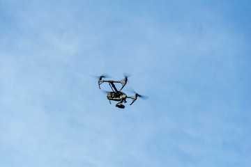 flying drone with camera on the sky