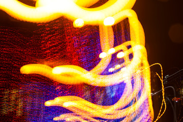 Christmas and New Year festive illumination on the city streets in blur with a shift