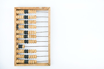 vintage wooden abacus on a white background with copy space