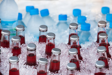 Freshly drinking water bottle in ice cooler box for sale.