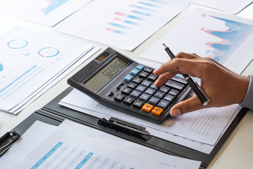 businessman working calculate data document graph chart report marketing research development  planning management strategy analysis financial accounting. Business office concept.