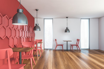 Red and white cafe interior with hexagons