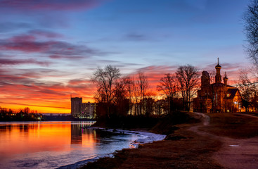 Bright December dawn on the Neva river in Rybatskoye district in