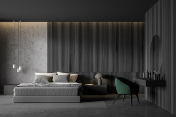 Concrete and dark wood bedroom with makeup table
