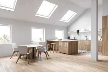 Attic white kitchen corner bar and dining table