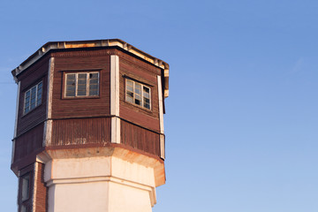 old wooden tower against the sky