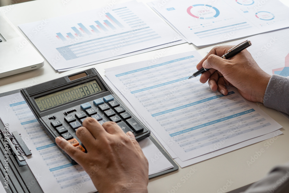 Aufkleber businessman working calculate data document graph chart report marketing research development planni