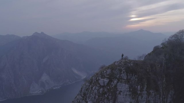 Hiker standing on viewpoint at Lake Como, Lombardy, Italy