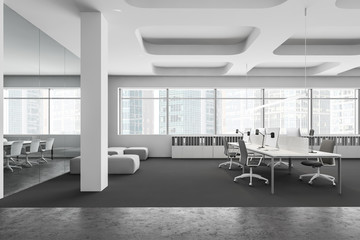 White open space office with lounge