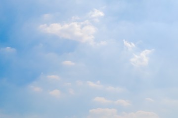Beautiful fluffy white clouds with blue sky and Sunlight, Nature background.