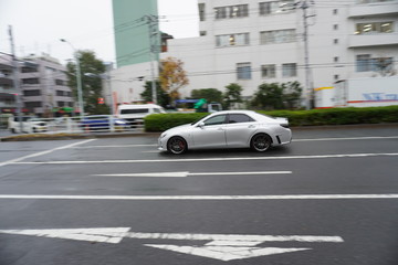Fototapeta na wymiar speeding car in the road
