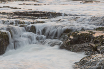 Water flowing on the rock formation.