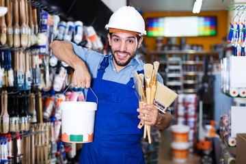 Master buying paint and tools