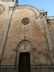 Fototapeta na wymiar Ostuni - Entrata della navata destra della Cattedrale