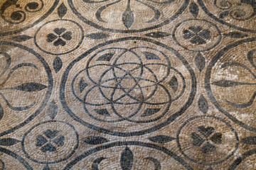 Fototapeta na wymiar Floor mosaic in Roman ruins, modern Rimini, Italy