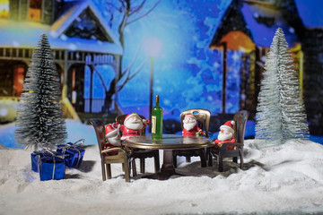 Fototapeta na wymiar Alcoholic Santa Drinking a Wine Bottle. Creative concept