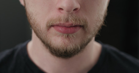 Obraz premium closeup shot of bearded man mouth