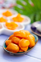 Thai desserts, Med Kanun (Mung Bean Yolk) Mung bean paste formed in egg yolk and sugar.