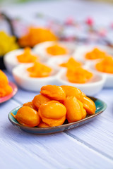 Thai desserts, Med Kanun (Mung Bean Yolk) Mung bean paste formed in egg yolk and sugar.