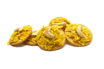 Crispy dried cracker topping by durian with cashews isolated on white background. The main ingredient is the king of fruits in Thailand and world famous.