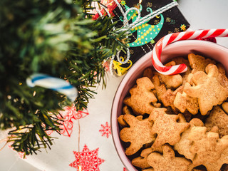 Fresh, fragrant homemade pastries and Christmas decorations. Close-up, side view. Tasty and healthy eating concept