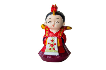 A decorative ceramic Korean figure, a female in traditional colorful clothes Han bock. Figure is allocated over a white background. Collecting. Hobby and leisure. Isolated