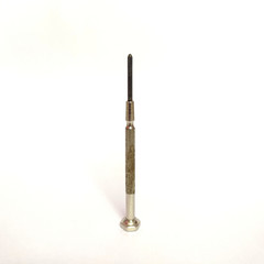 A precision screwdriver kept upright isolated on white background. The screwdriver is star pointed.