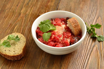 Chicken in spicy tomato sauce with dates, copy space