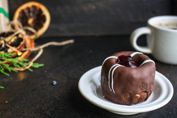 chocolate cake with filling, festive table setting (coffee, gifts, sweets) menu concept. food background. top view. copy space